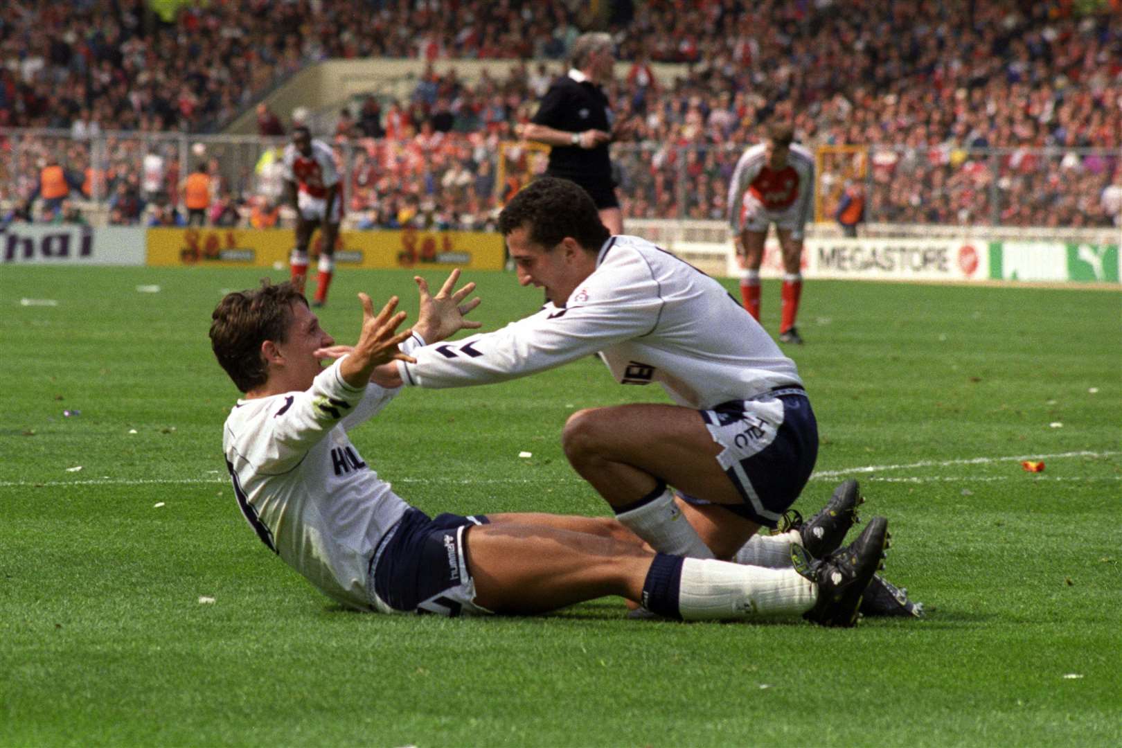 Gary Lineker celebrates with Vinny Samways after scoring a goal for Spurs (PA)