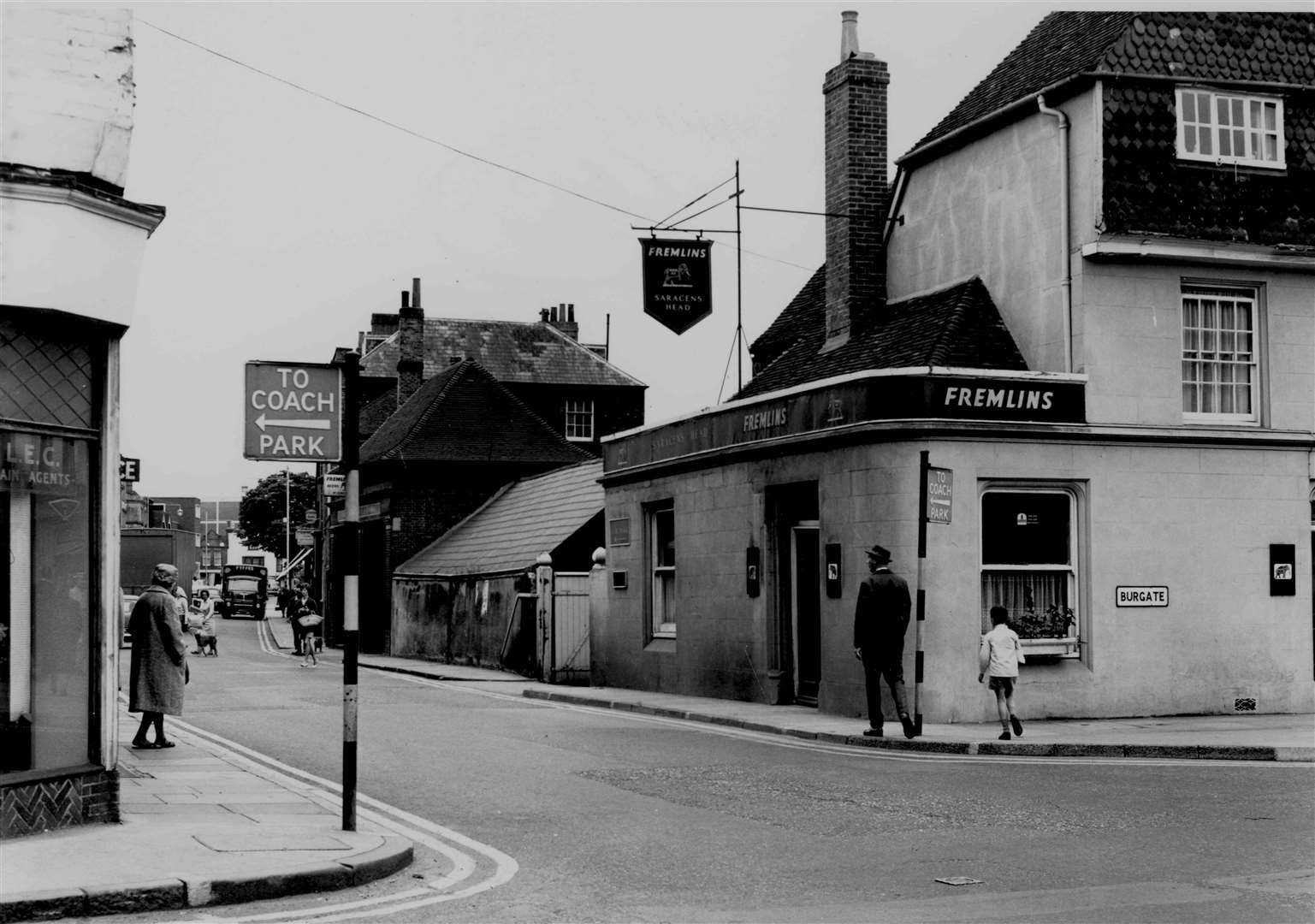 Unrecognisable today, a view down Lower Bridge Street in Canterbury in May 1968 towards what is now St George's roundabout. The Saracen's Head pub (right) on the corner of Burgate, was demolished in 1969 to make way for the ring-road