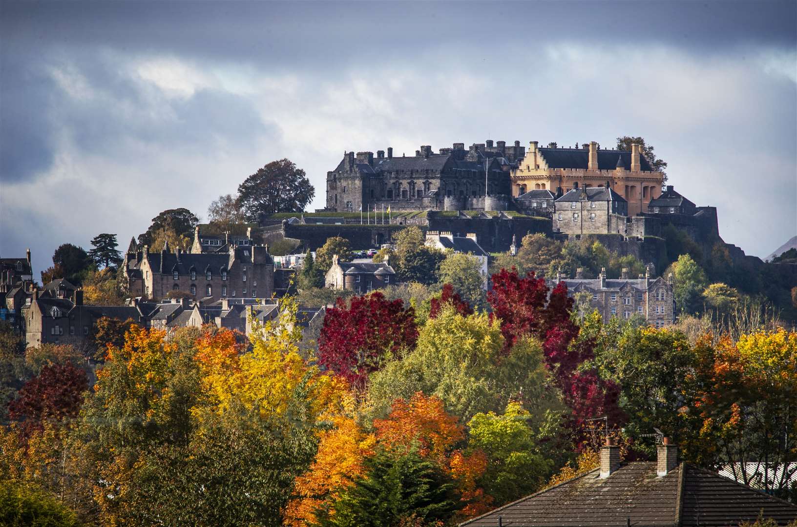 Stirling Castle surrounded by trees displaying their autumn colours (Jane Barlow/PA)