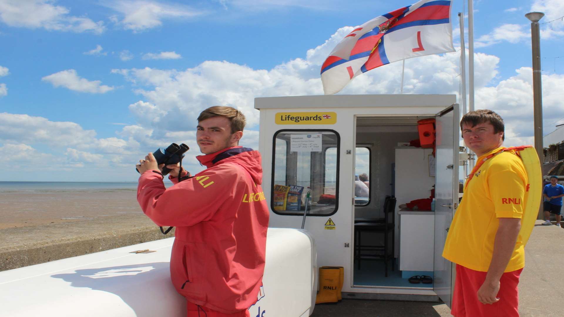 Lifeguards Jamie Hopper and George Rose on duty at Leysdown. Stock photo.