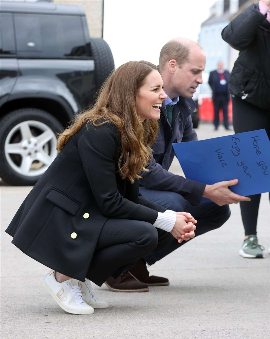 The Duke and Duchess of Cambridge speak with young children during a meeting with fishermen on their visit to Fife (Chris Jackson/PA)