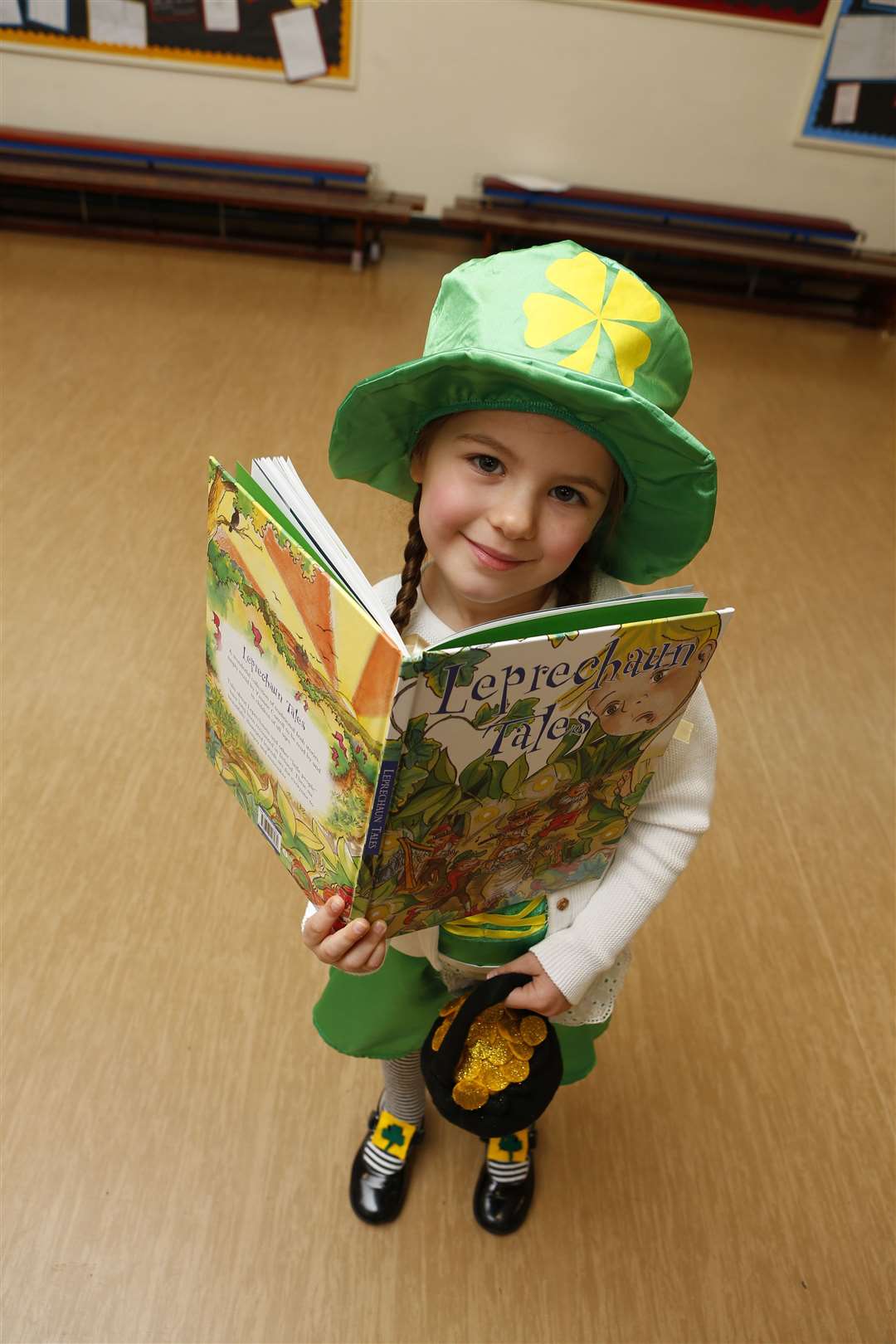 Children dressed up for World Book Day. Pictured is Isla from Elephant Class dressed as a Leprechaun from Leprechaun Tales..Lunsford Primary School, Swallow Road, Larkfield ME20 6PY.Picture: Andy Jones. (7640577)