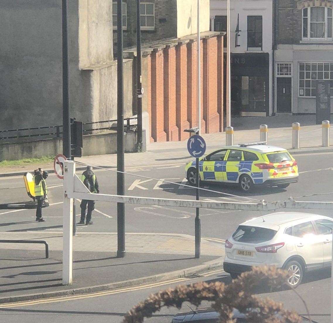 Police in Chatham town centre after a man fell of his bike