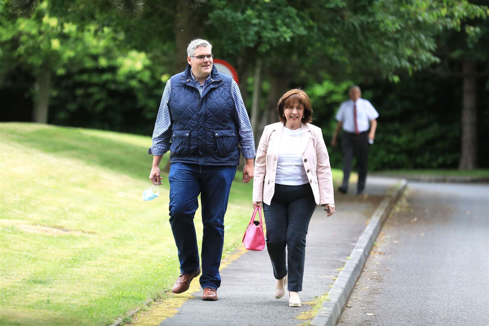 DUP members Gavin Robinson and Diane Dodds outside the Hilton Hotel in Templepatrick (Peter Morrison/PA)