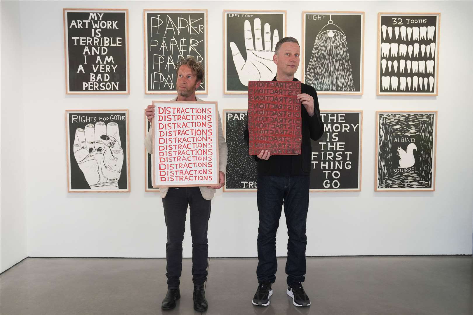 Michael Schafer (left) and David Shrigley at the Jealous Gallery in Shoreditch, London (Lucy North/PA)