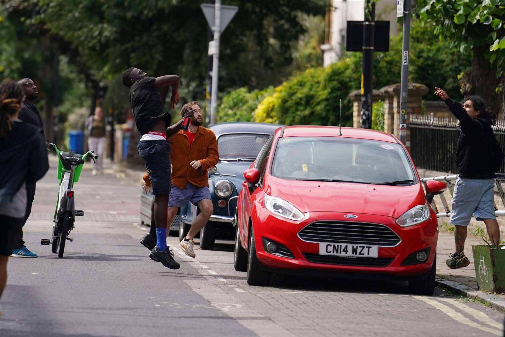 Tom Kellow has his phone thrown by the people who removed a new artwork by Banksy (Jordan Pettitt/PA)