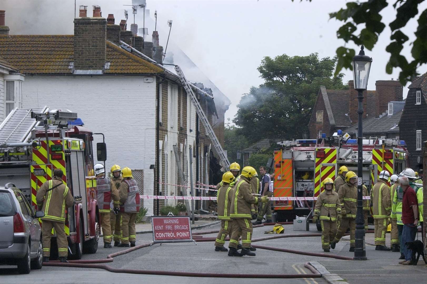 The scene in Abbey Street, Faversham, as Firefighters dealt with the aftermath of the gas explosion