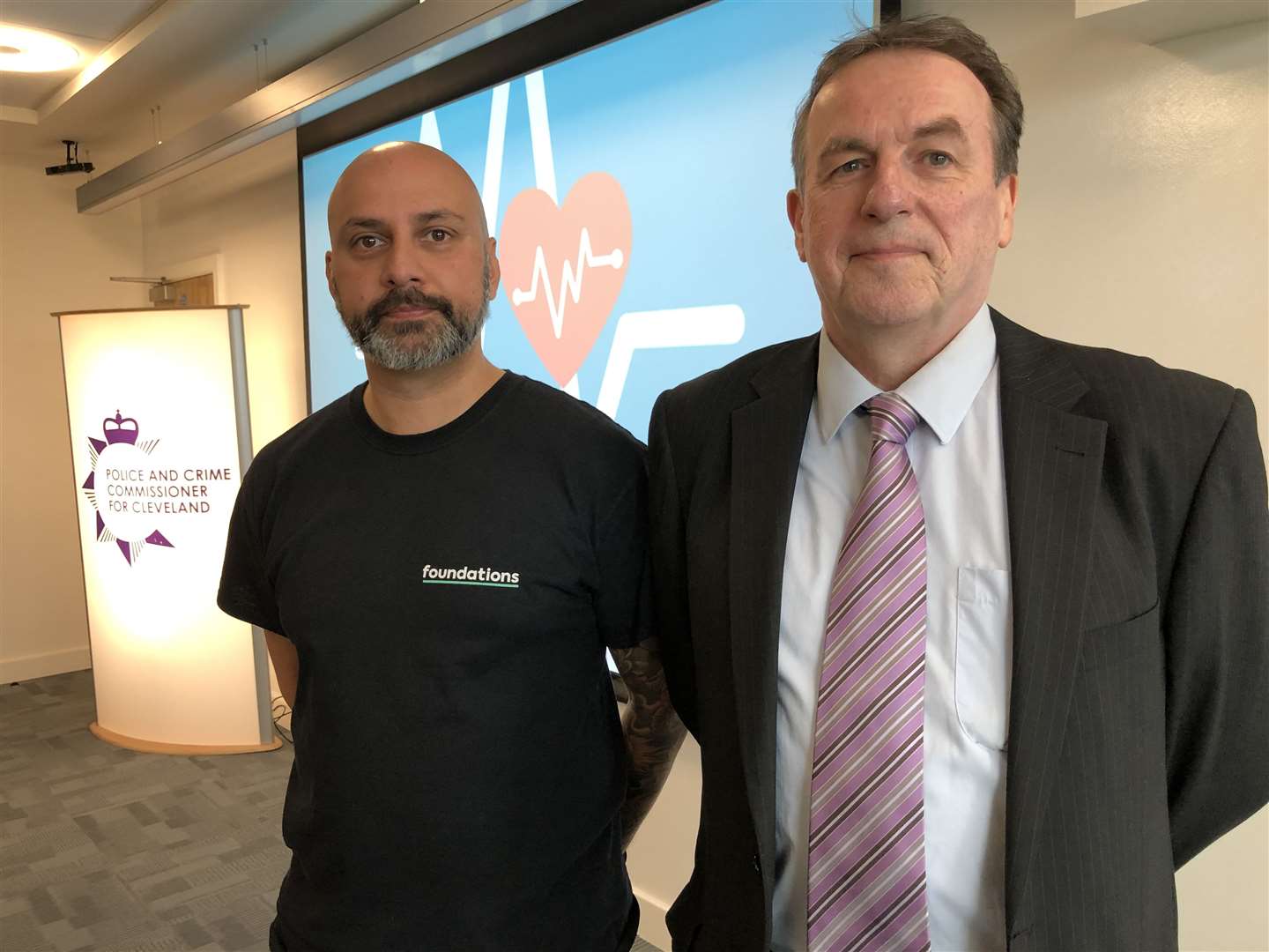 Clinical lead Danny Ahmed with former Police and Crime Commissioner Barry Coppinger (Tom Wilkinson/PA)