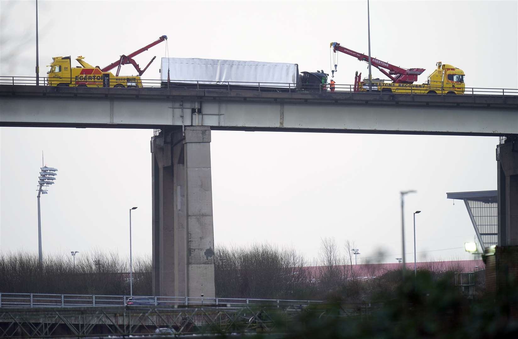 An overturned lorry on the M60, near Trafford Park in Manchester (Danny Lawson/PA)