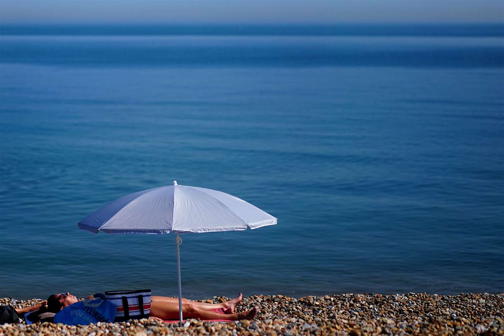 September was a tale of two halves, with sun worshippers back on the beaches during a heatwave in the early part of the month – which later made way for Storm Agnes (Victoria Jones/PA)