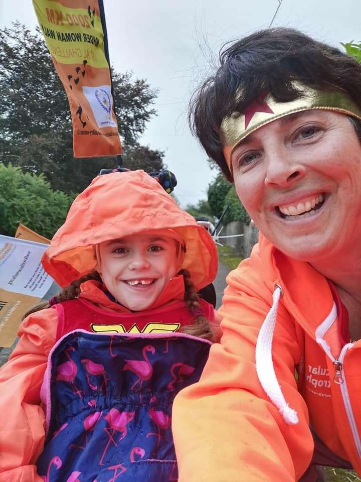 Carmela completed the challenge with her mum Lucy at her side (Muscular Dystrophy UK/PA)