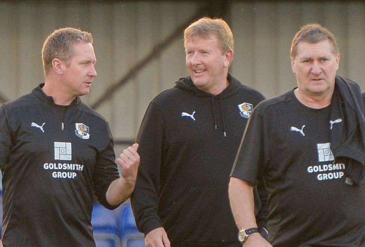 Dartford assistant Roland Edge, left, and boss Ady Pennock, centre, can trust the club’s youngsters to perform when it counts. Picture: Stuart Watson