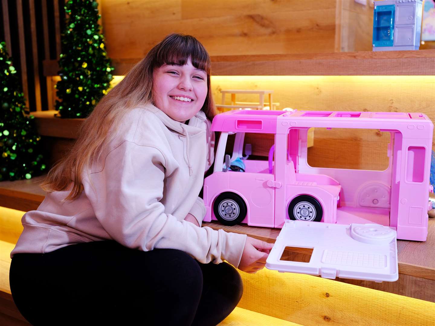 A child with Barbie 3-in-1 DreamCamper (Toy Retailers Association/PA)