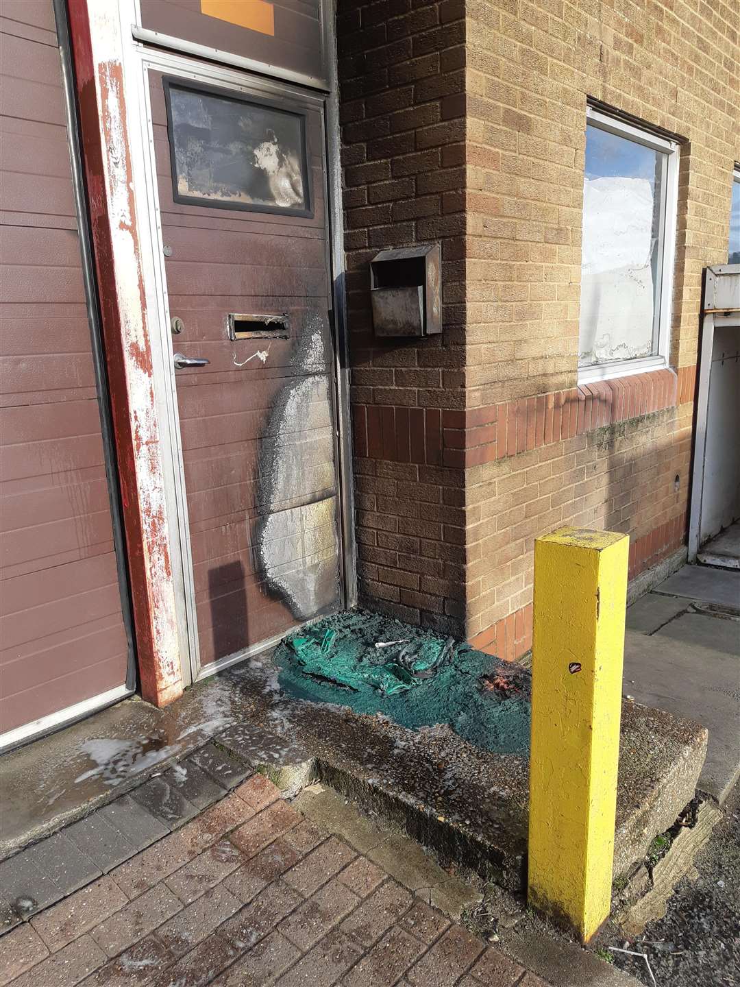 The fire burnt a plastic container and damaged the door, but it could have been a lot worse if the neighbours didn't spot it. (6704090)