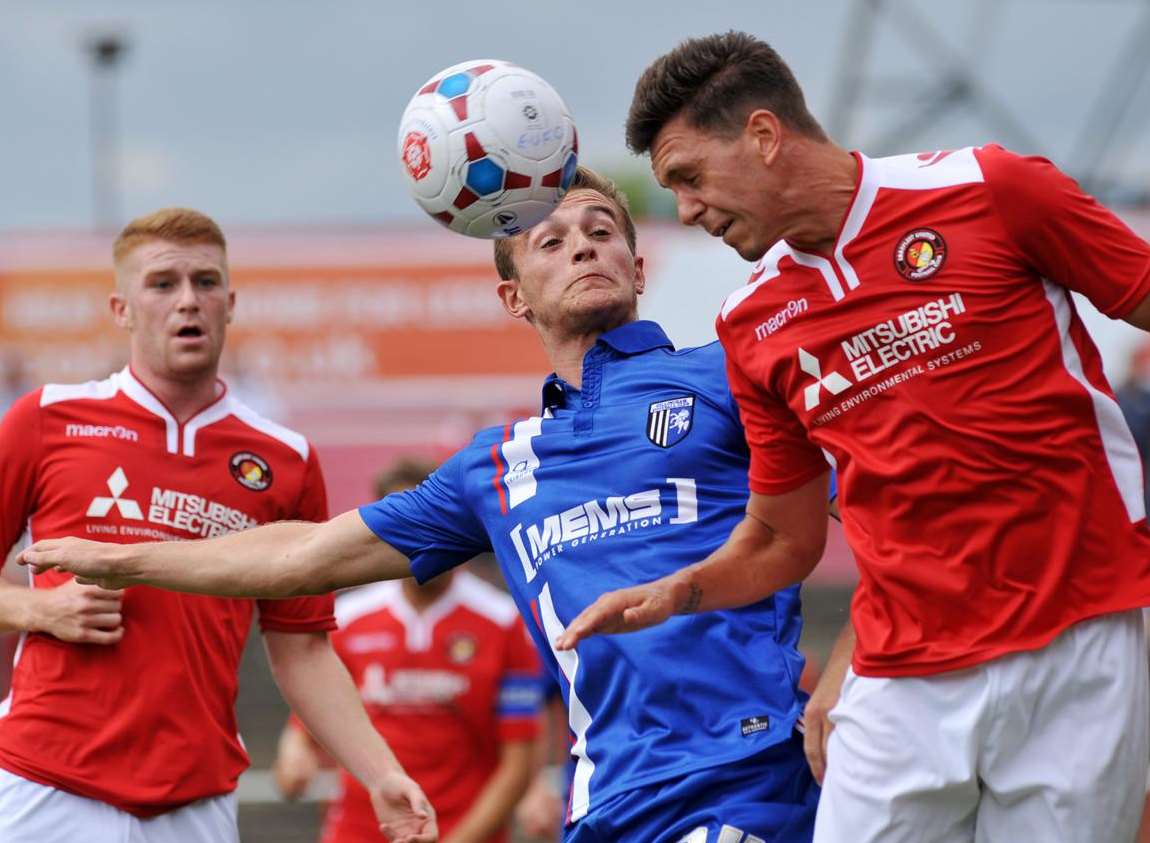 Gillingham's Brennan Dickenson challenges Joe Howe of Ebbsfleet Picture: Richard Eaton