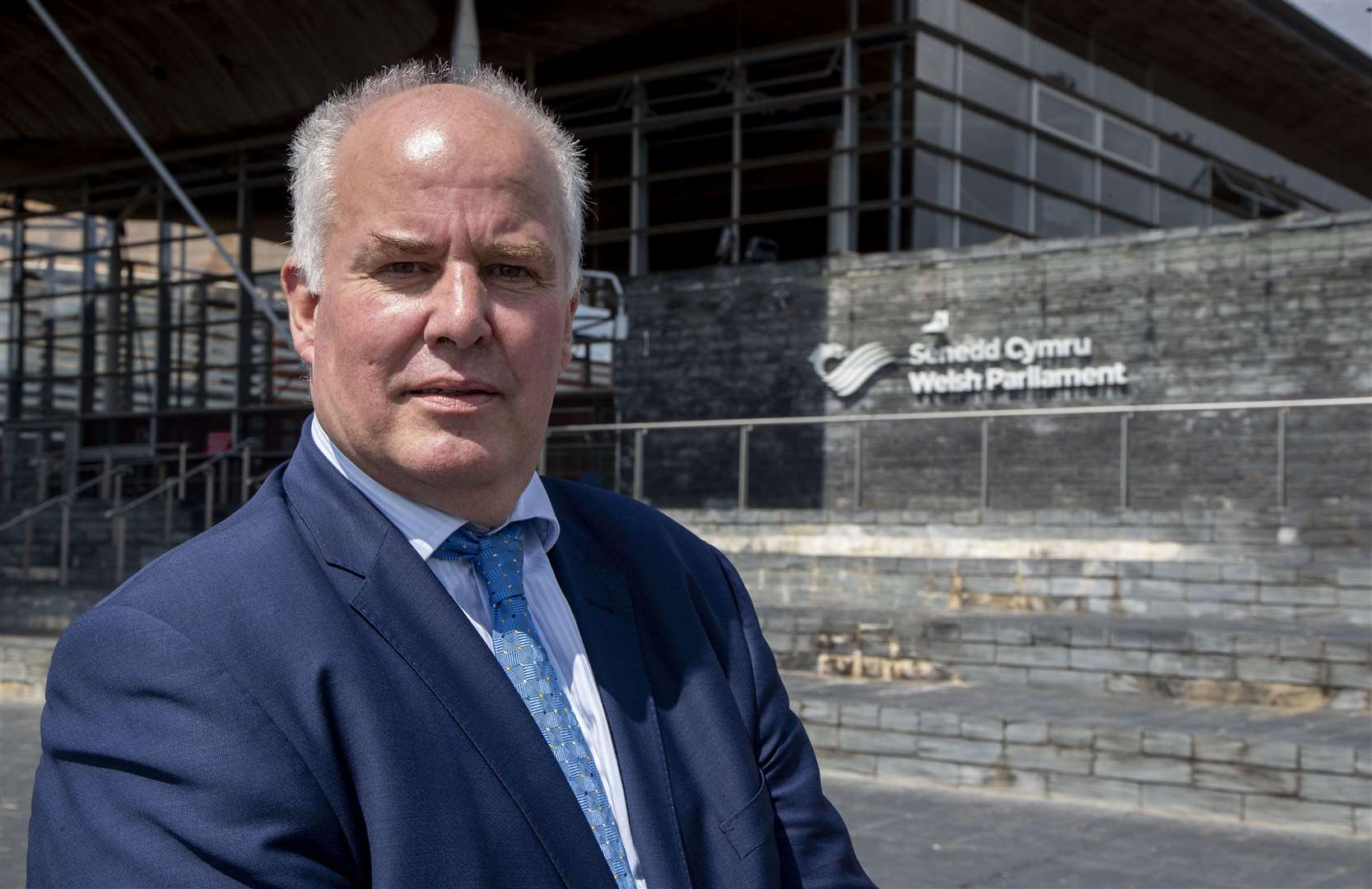 Leader of the Welsh Conservatives Andrew RT Davies standing outside the Senedd (Geoff Caddick/PA)