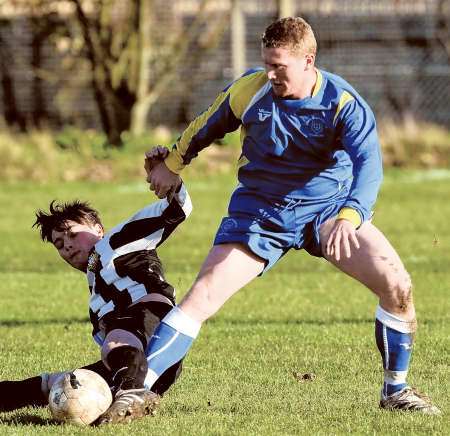 Sheerness East, blue, are stopped in their tracks by University of Kent