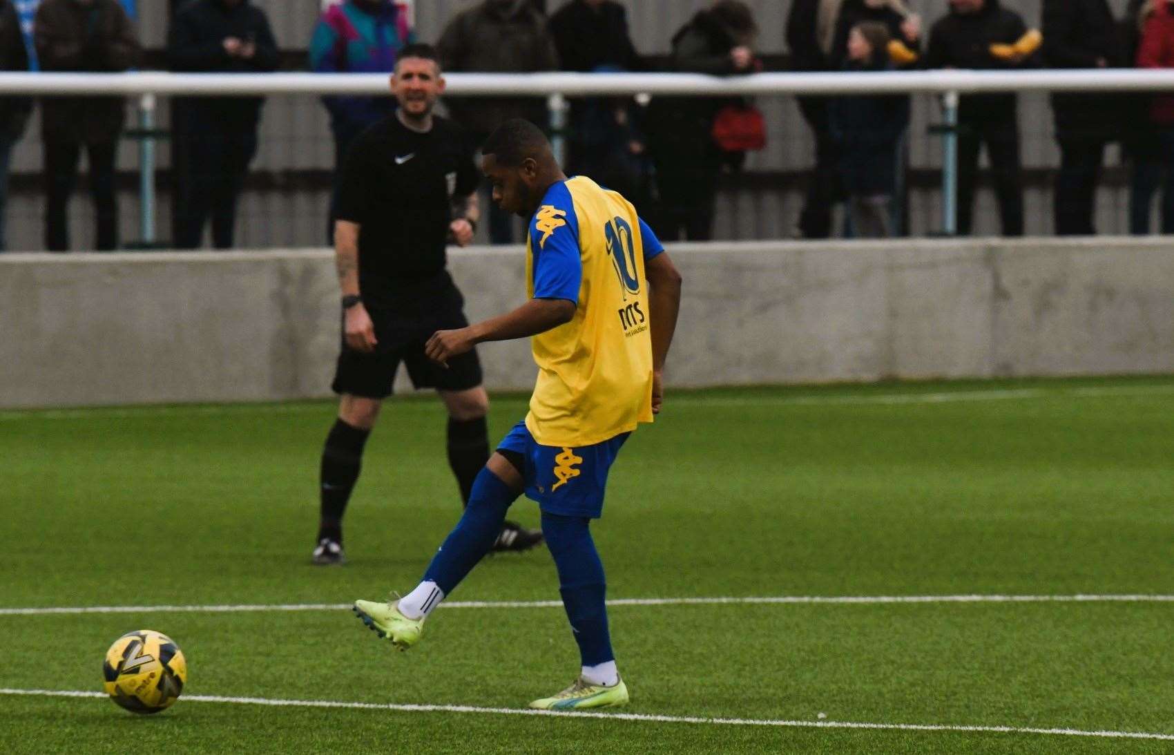 Faversham's Kieron Campbell gets the match under way. Picture: Marc Richards