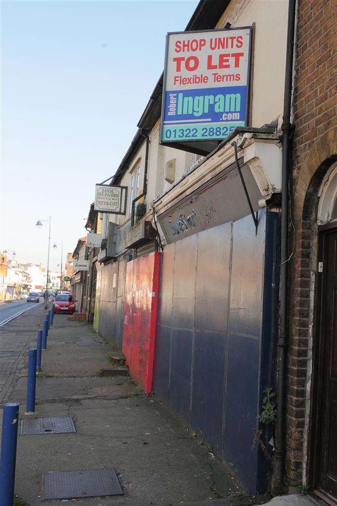 Boarded-up building in the development zone