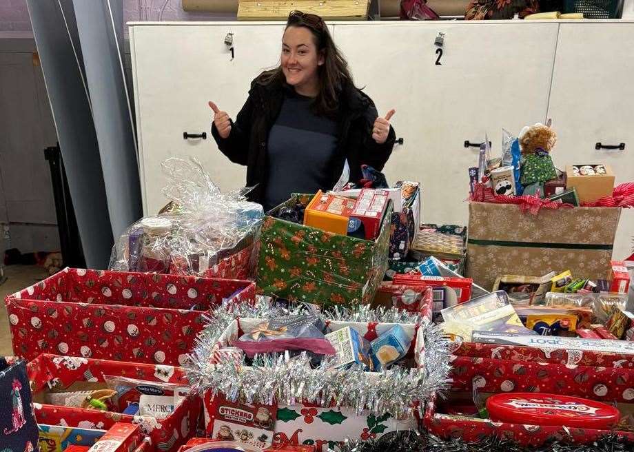 'Hampers of Hope' donations made by teams from Iwade Herons FC, with one of the organisers India Weston