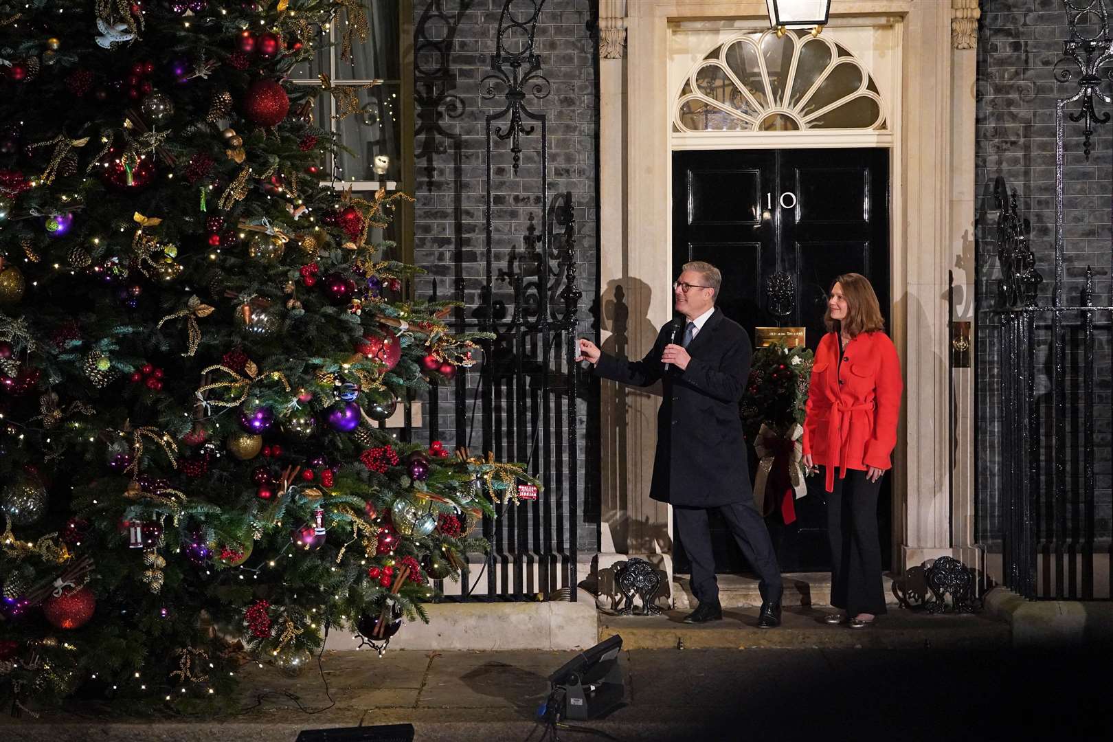 Prime Minister Sir Keir Starmer and his wife Lady Victoria Starmer switched on the Downing Street Christmas lights (Lucy North/PA)