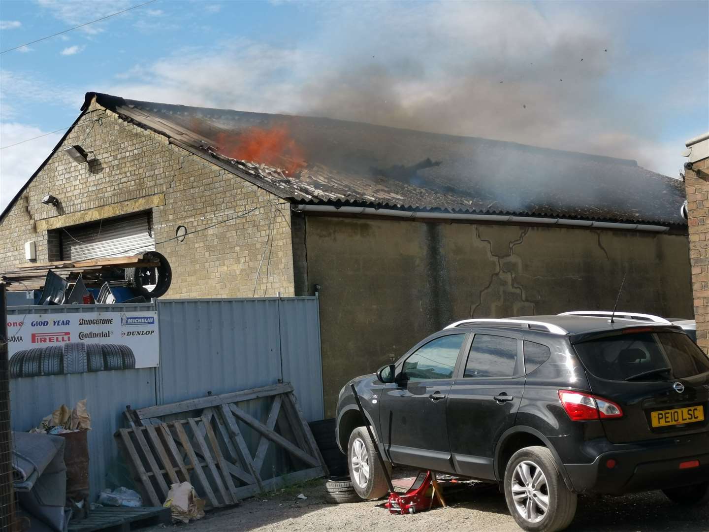 Flames and smoke can be seen coming from the roof of the factory in Rushenden Road, Rushenden