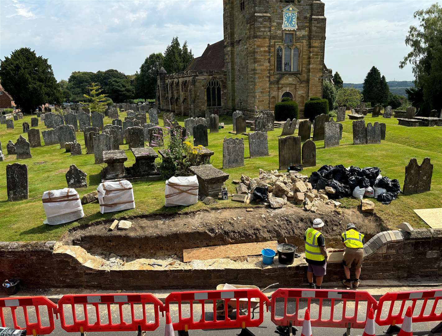 Work is in progress to lower the wall at St Mary the Virgin Church in Goudhurst