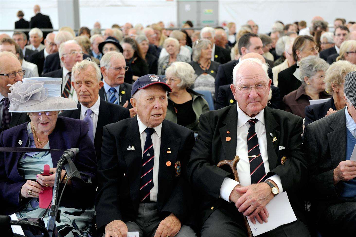 Veterans at a memorial service for the sailors