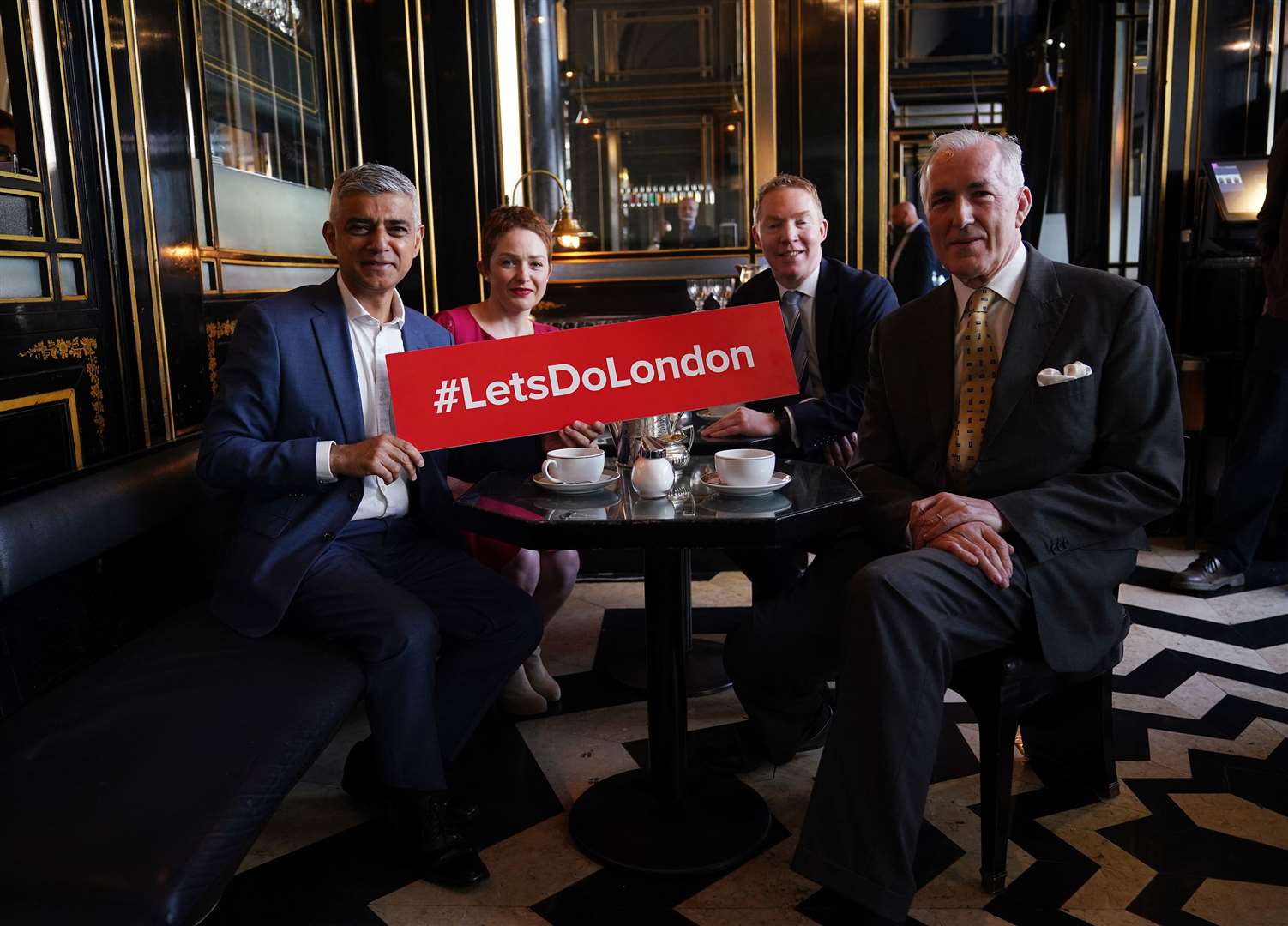 Mayor of London Sadiq Khan and Ros Morgan, visit The Wolseley cafe restaurant, with its co-owner Jeremy King (right), (Yui Mok/PA)