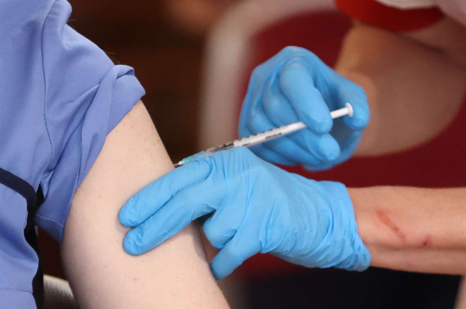 Researchers found vaccine hesitancy was higher in younger people, women, and those on lower incomes (Liam McBurney/PA)