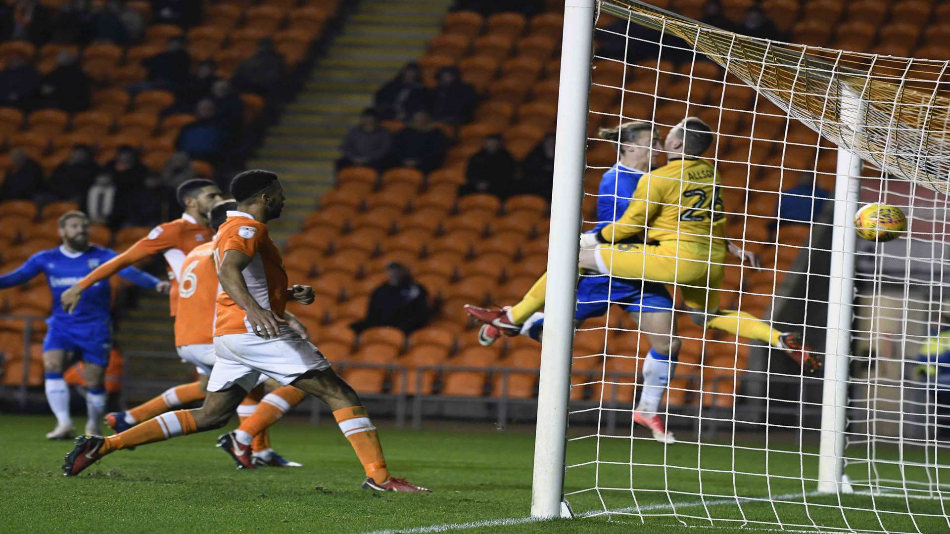 Tom Eaves heads the ball and the keeper to grab a late equaliser for Gillingham Picture: Barry Goodwin