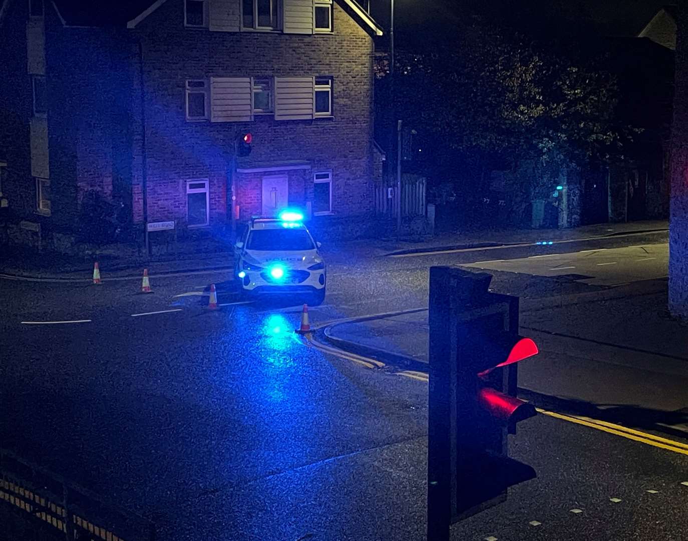 Police officers closed Well Road near the junction with Wheeler Street