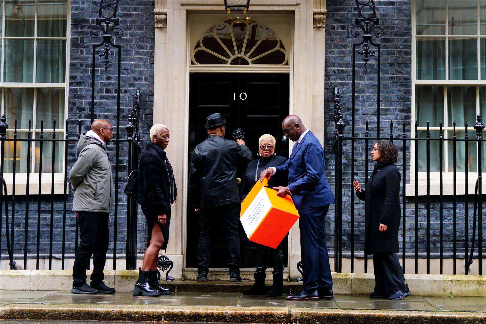 Windrush campaigners hand in a petition to 10 Downing Street (Victoria Jones/PA)