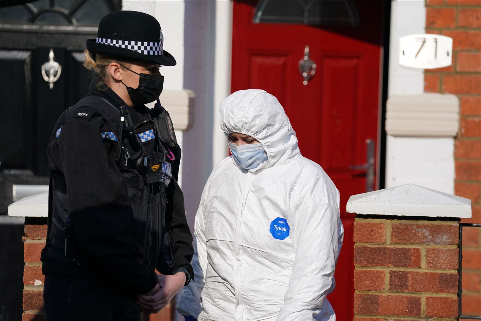 Forensic officers at the scene last March (Jacob King/PA)