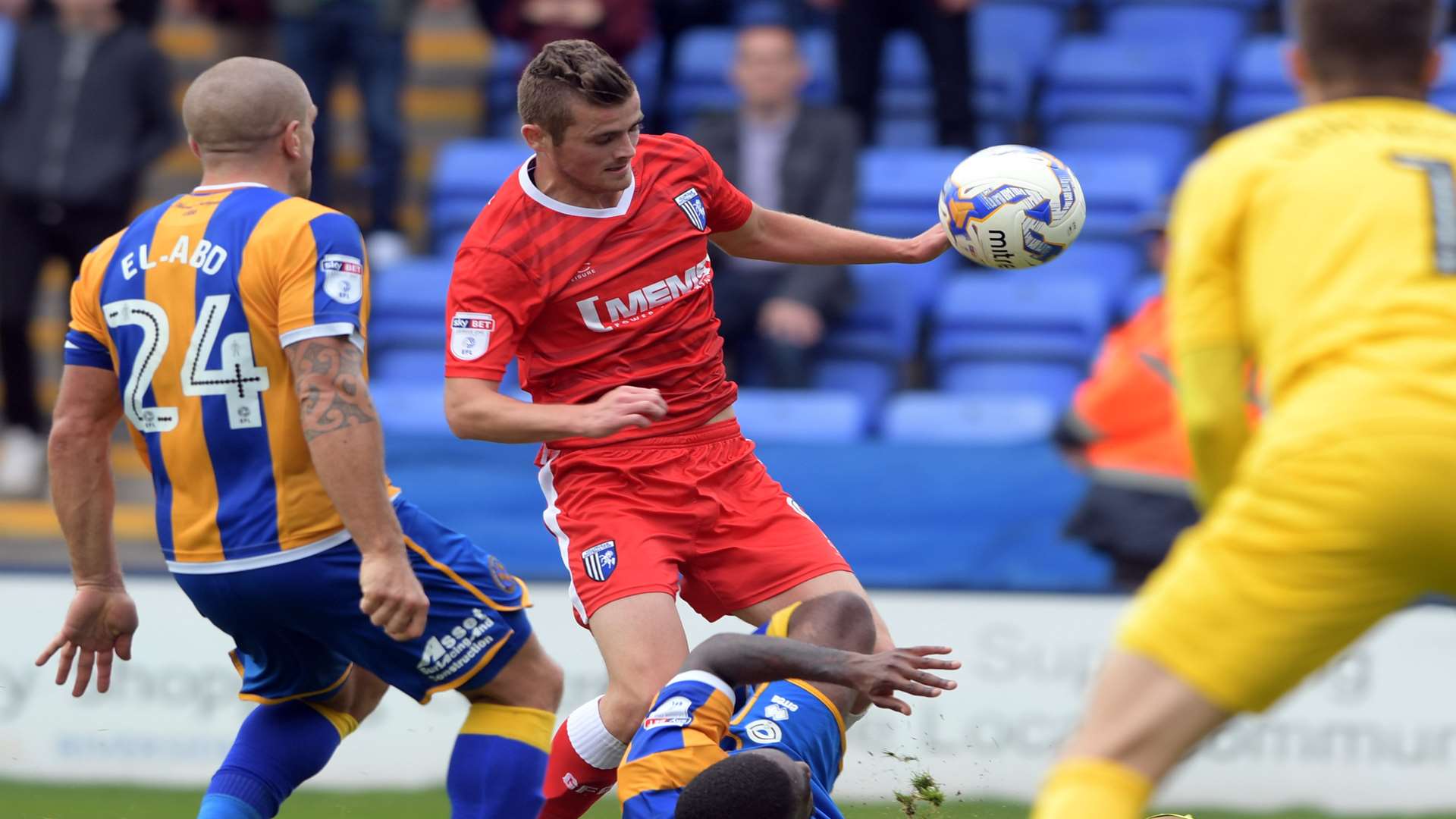Rory Donnelly causes problems in the Shrews defence as former Gills team-mate Adam El-Abd watches on Picture: Barry Goodwin