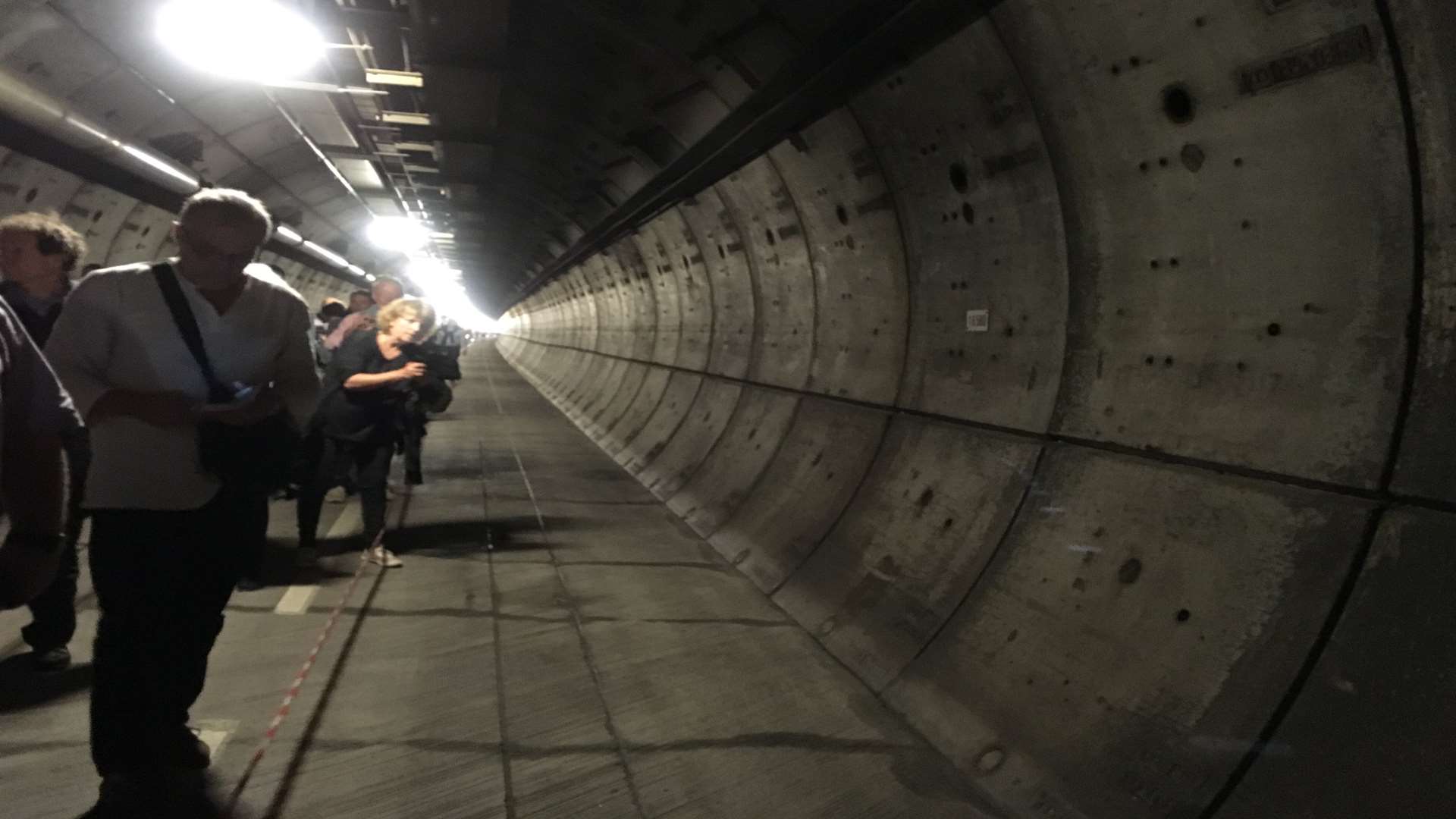 Passengers wait in the tunnel. Picture: Aggie Amin