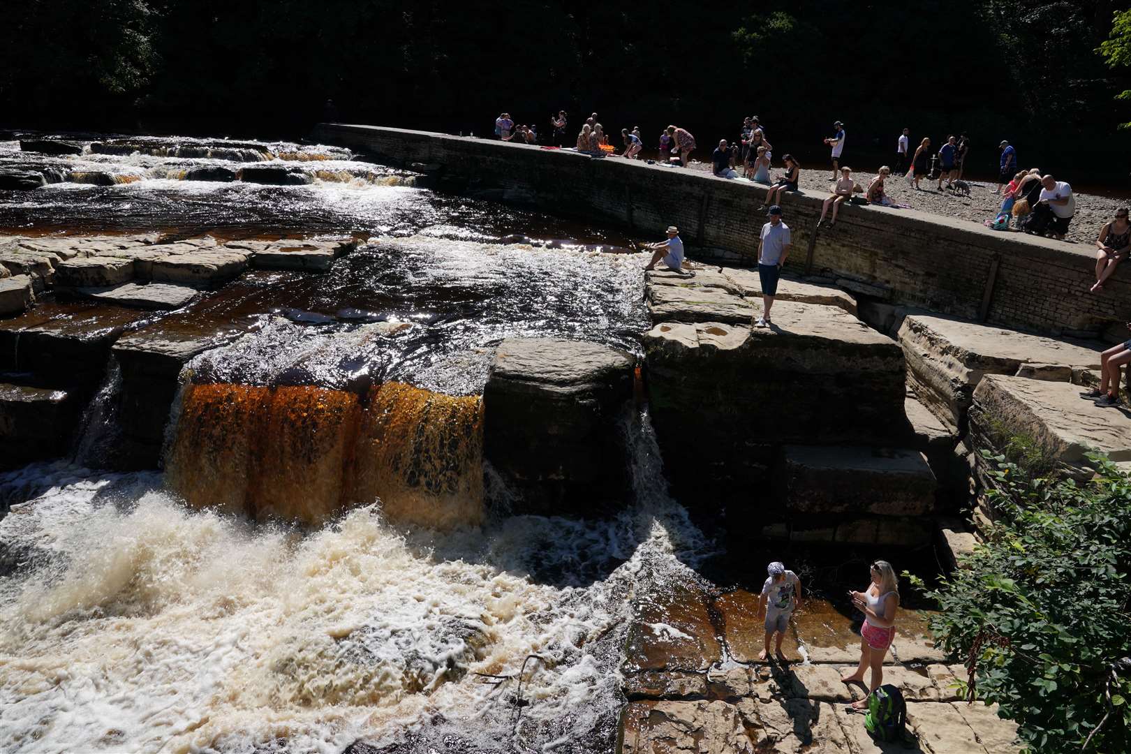 Sun-seekers flocked to the North Yorkshire beauty spot (Owen Humphreys/PA)