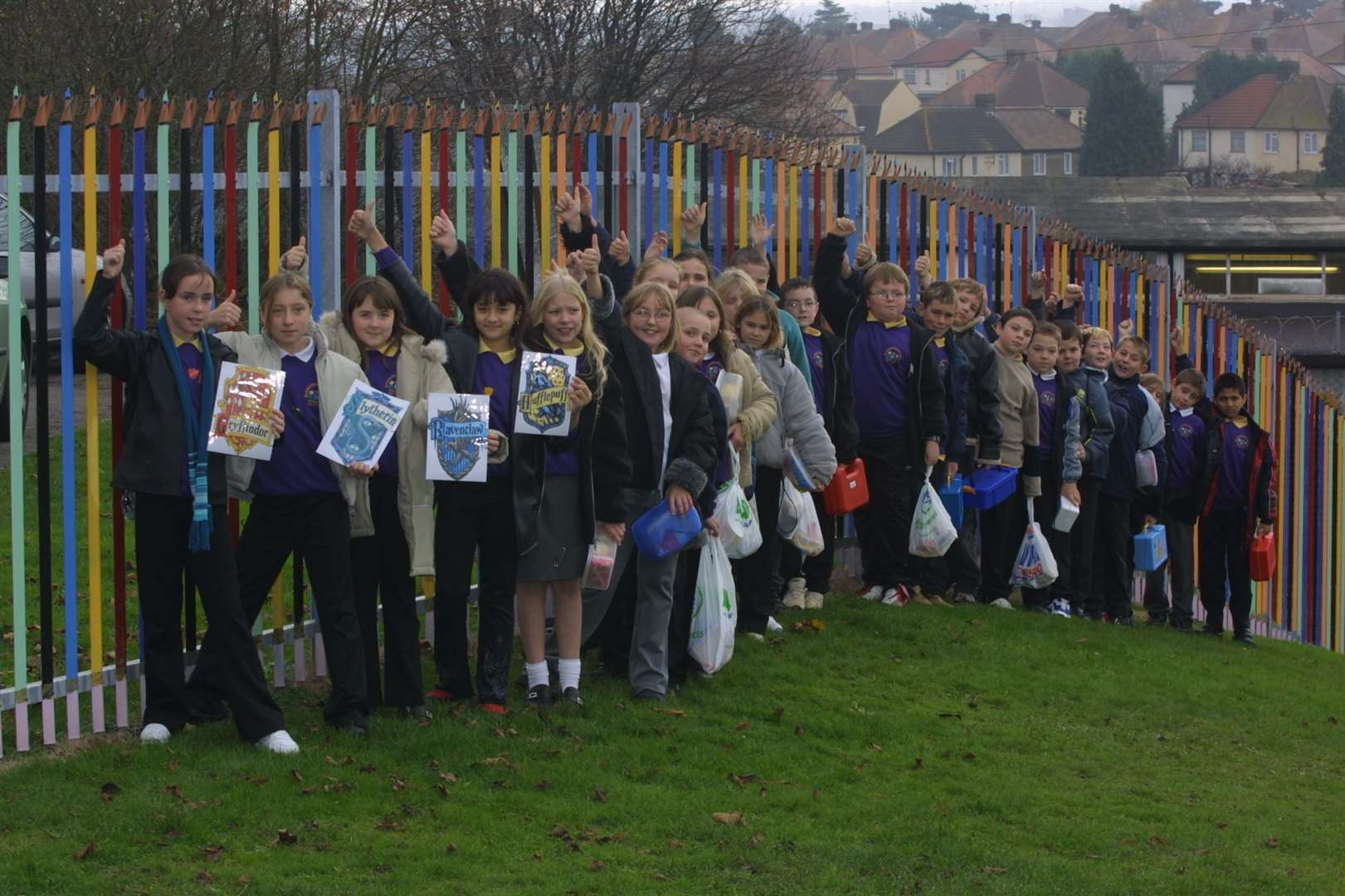 Kids from Elaine Primary School in Strood jump for joy at the prospect of going to see Harry Potter and the Chamber of Secrets on a school trip in November 2002