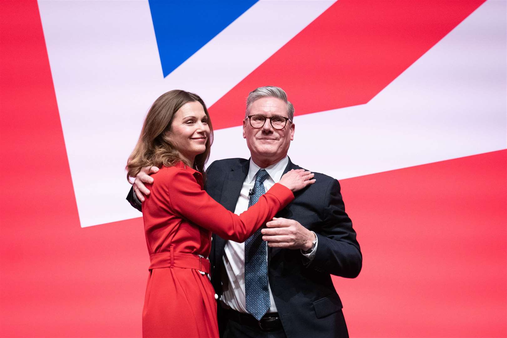 Prime Minister Sir Keir Starmer is joined on stage by his wife Victoria (Stefan Rousseau/PA)