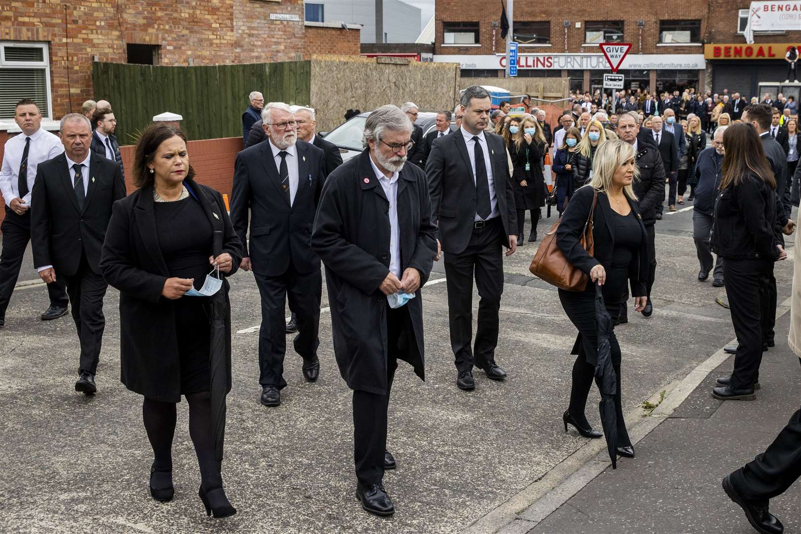 (left to right) Sinn Fein leader Mary Lou McDonald, former Sinn Fein leader Gerry Adams, and Deputy First Minister Michelle O’Neill arrive at St Agnes’ Church in west Belfast for the funeral of senior Irish Republican and former leading IRA figure Bobby Storey (Liam McBurney/PA)