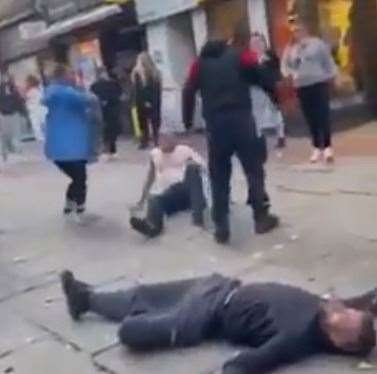 The fight took place outside McDonald's in Ashford town centre