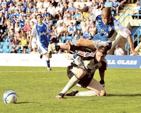 Simeon Jackson is brought down by replacement keeper Declan Rudd