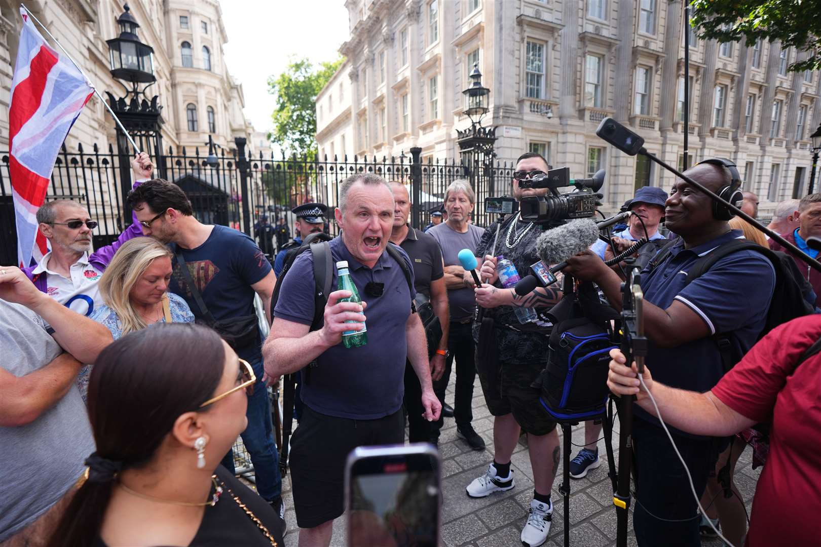 Protesters gathered outside Downing Street in London after Robinson was arrested (James Manning/PA)