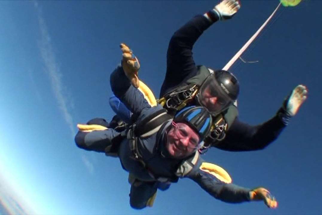 Folkestone bus driver John Sabine (underneath) took to the skies above Headcorn in memory of friend's granddaughter. Picture: AirAffair Photography