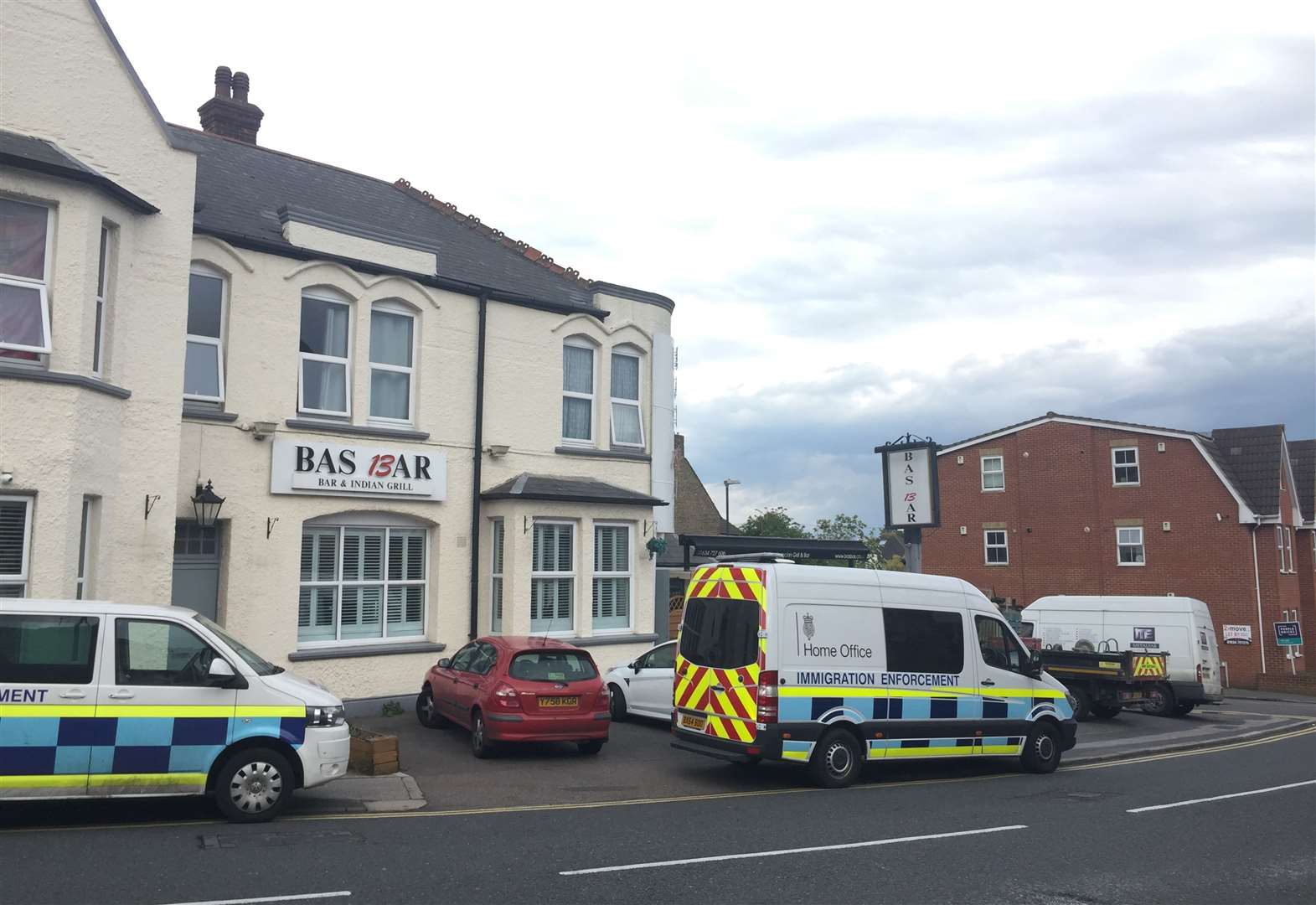 Immigration Vans At Indian Restaurant The Bas Bar In Rochester