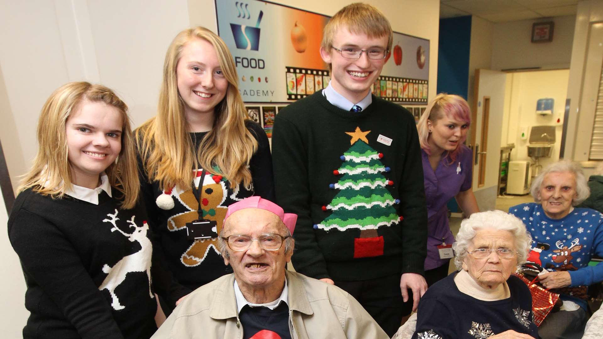 Henry Tolhurst and Dorothy Spooner, of Barton Court Care Home, with Conner Matthams, Devon Dumont and Lauren Glock all 17