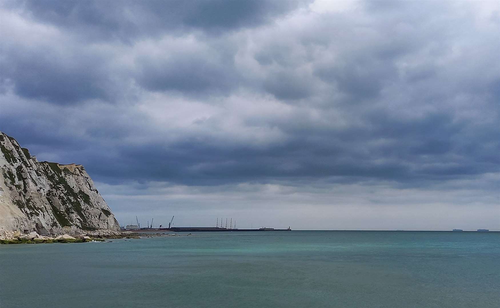 The tall masts can be seen from Samphire Hoe