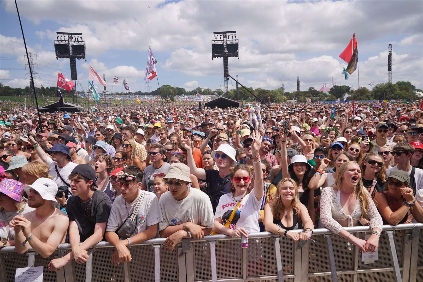 Revellers enjoyed warm weather as Glastonbury got under way (Yui Mok/PA)