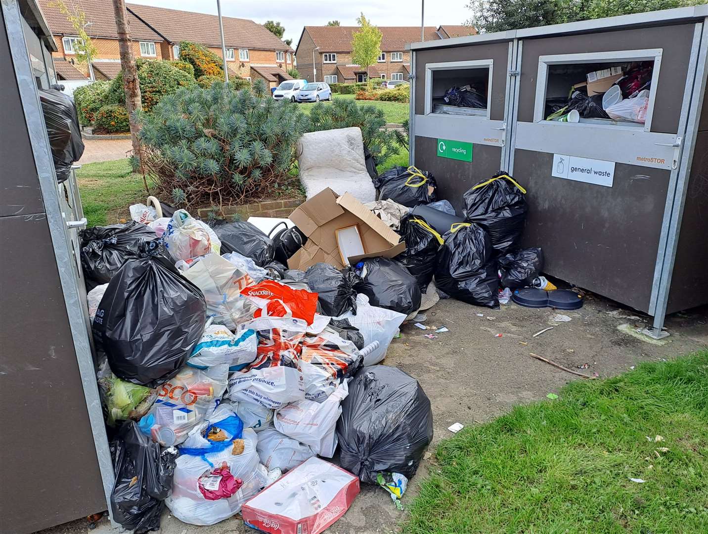 The rubbish outside Deham House, Cavell Way, includes bin bags, mattresses and cardboard boxes