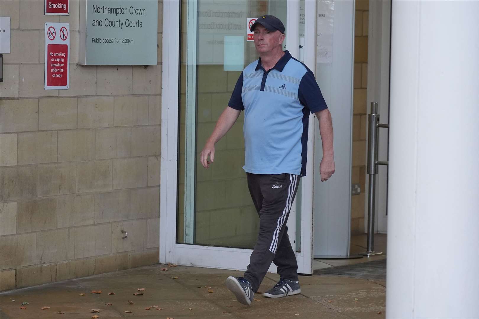 Conservative councillor Raymond Connolly leaves Northampton Crown Court after his wife, Lucy Connolly, pleaded guilty (Jacob King/PA)